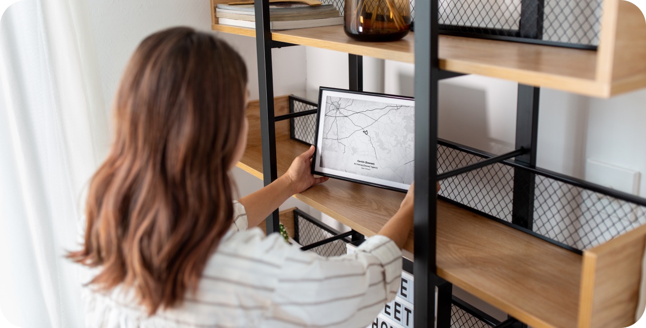 Person holding a map frame with an Irish townland